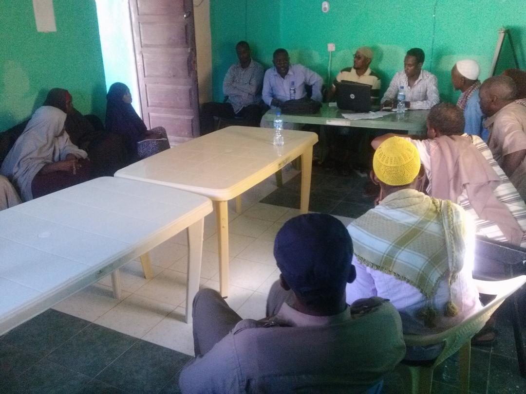 Community awareness meeting on trafficking risks facilitated by field staff