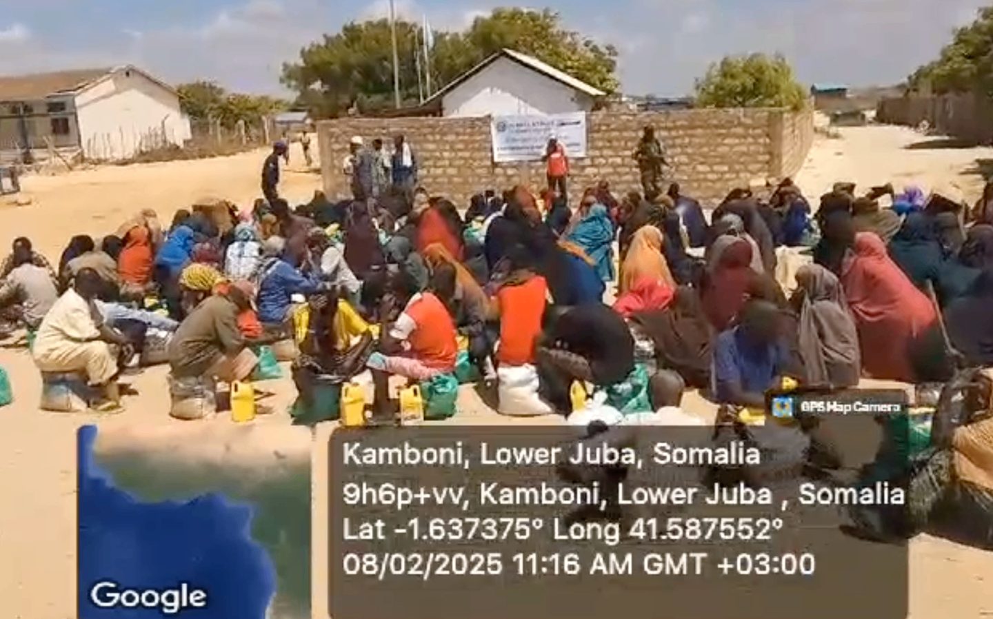 Community members gathered at a JCC food distribution site in Ras Kambooni